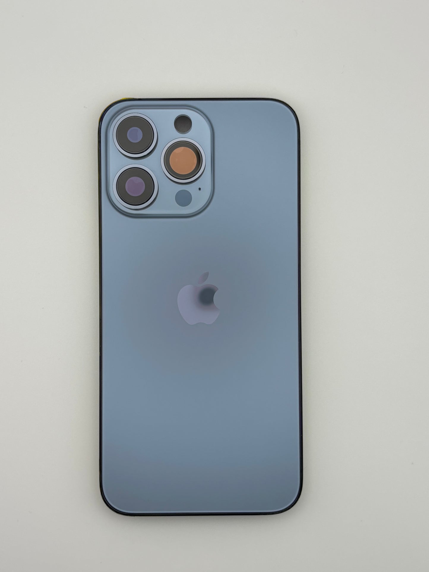 iPhone 13 Pro rear housing in blue – OEM style frame with SIM tray and buttons (Rear)
